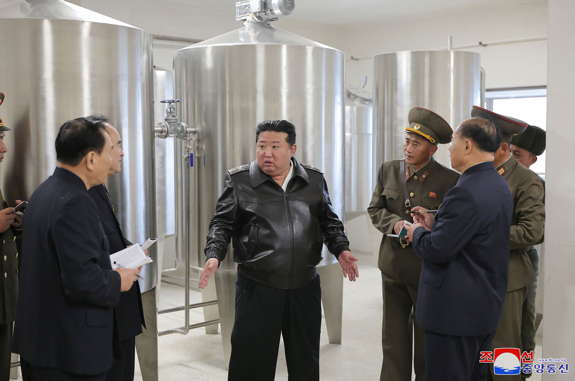 President of State Affairs Kim Jong Un gives field guidance at regional-industry factories under construction in Jaeryong County