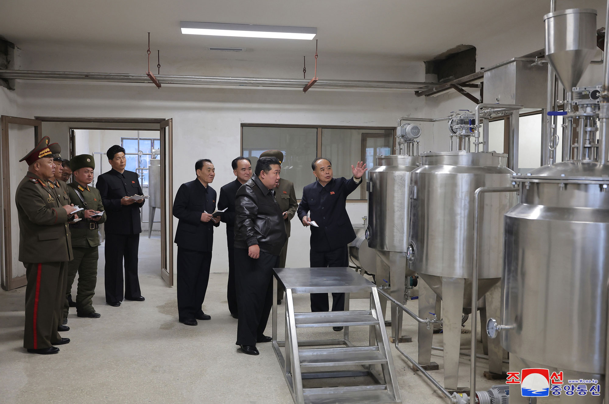 President of State Affairs Kim Jong Un gives field guidance at regional-industry factories under construction in Jaeryong County