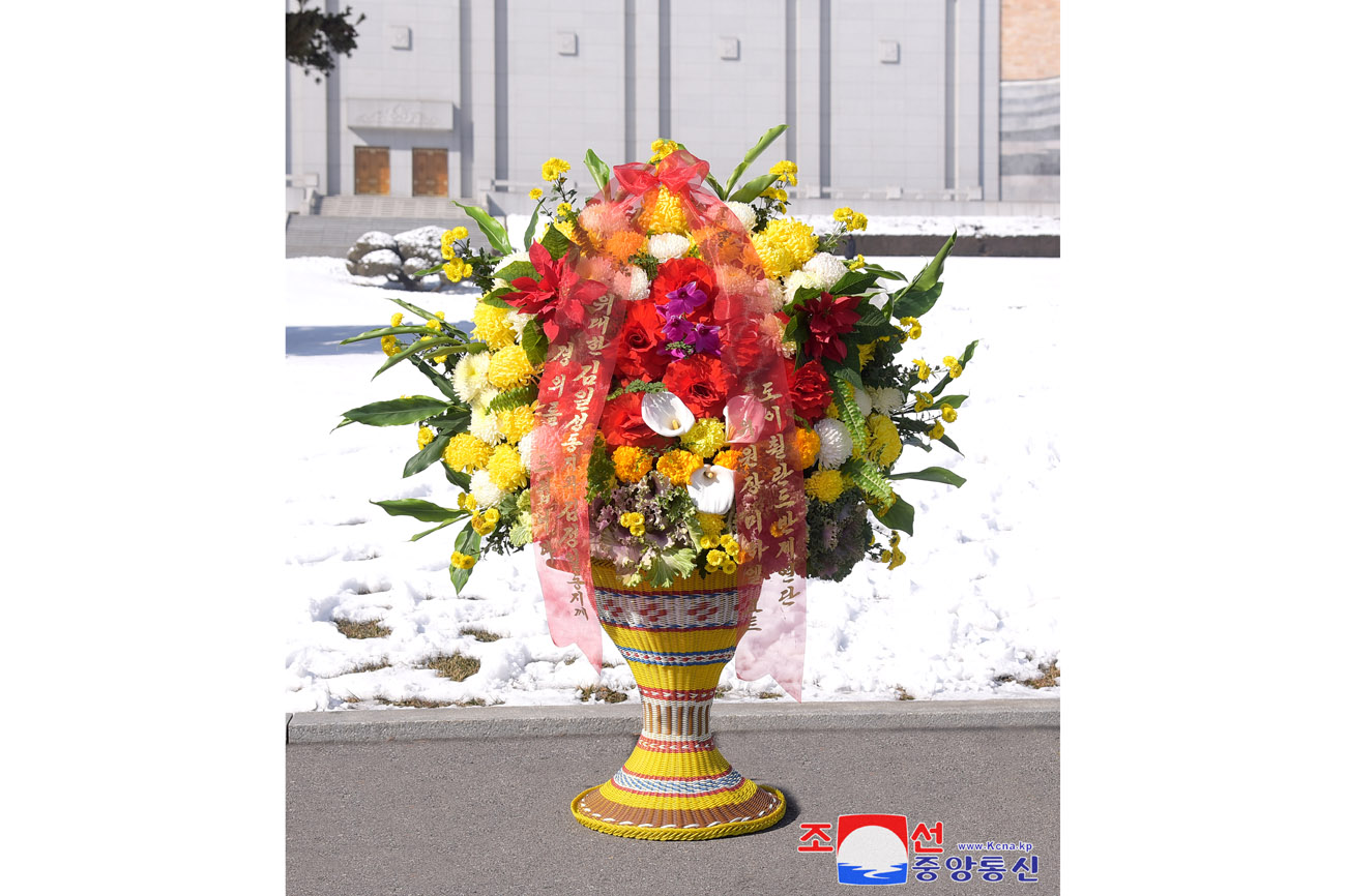 Floral baskets to bronze statues of great leaders Kim Il Sung and Kim Jong Il from abroad