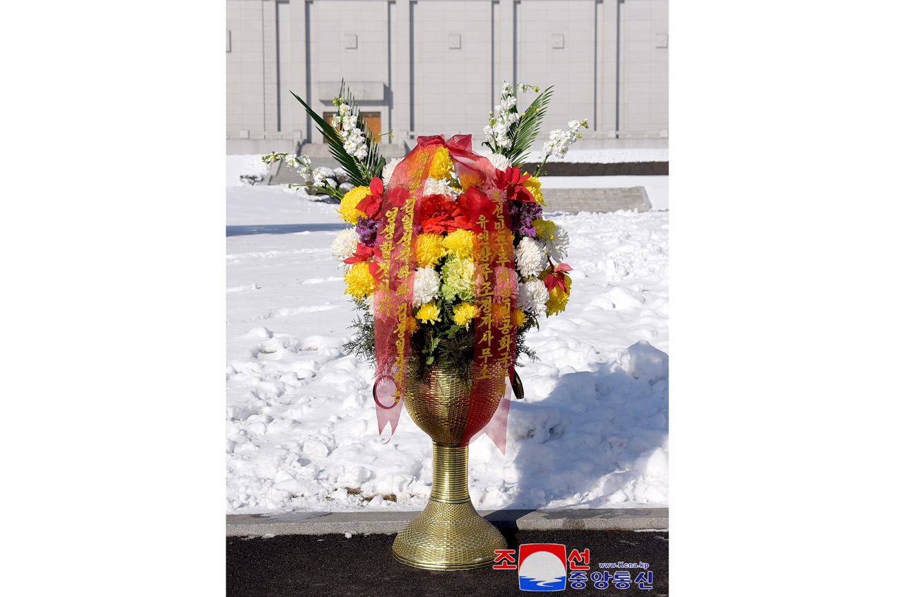 Floral baskets to bronze statues of great leaders Kim Il Sung and Kim Jong Il from abroad