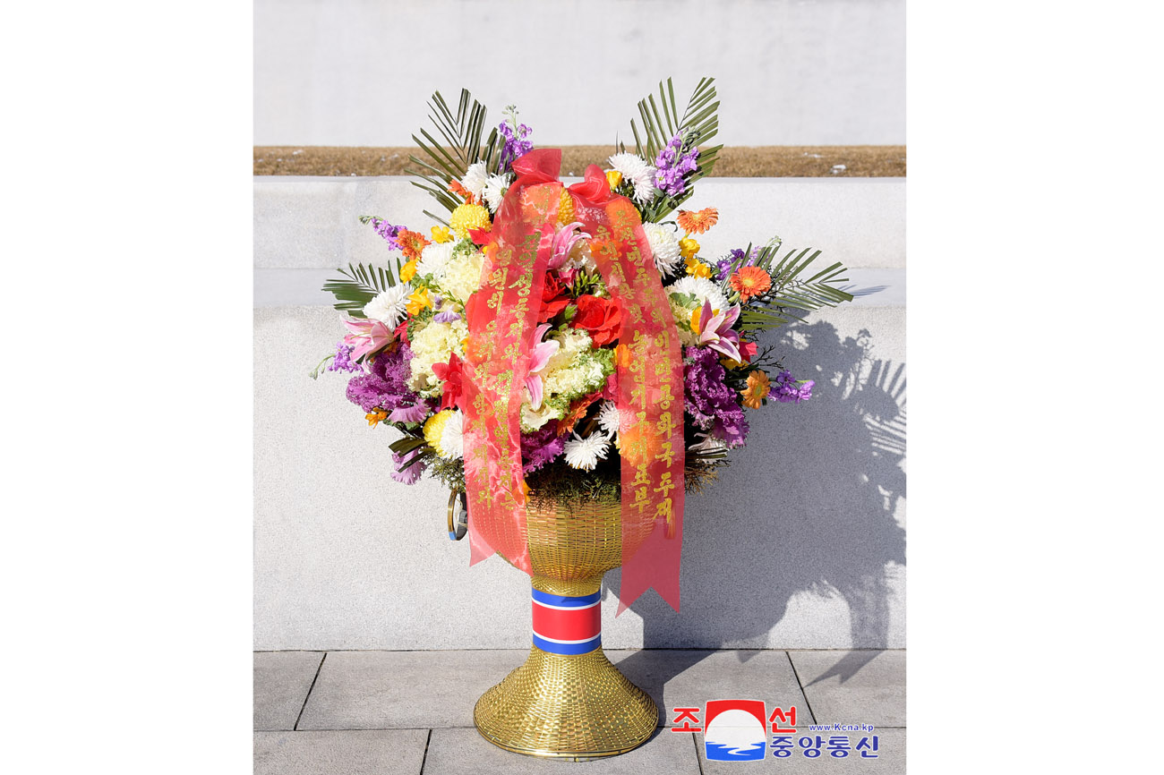 Floral baskets to bronze statues of great leaders Kim Il Sung and Kim Jong Il from abroad